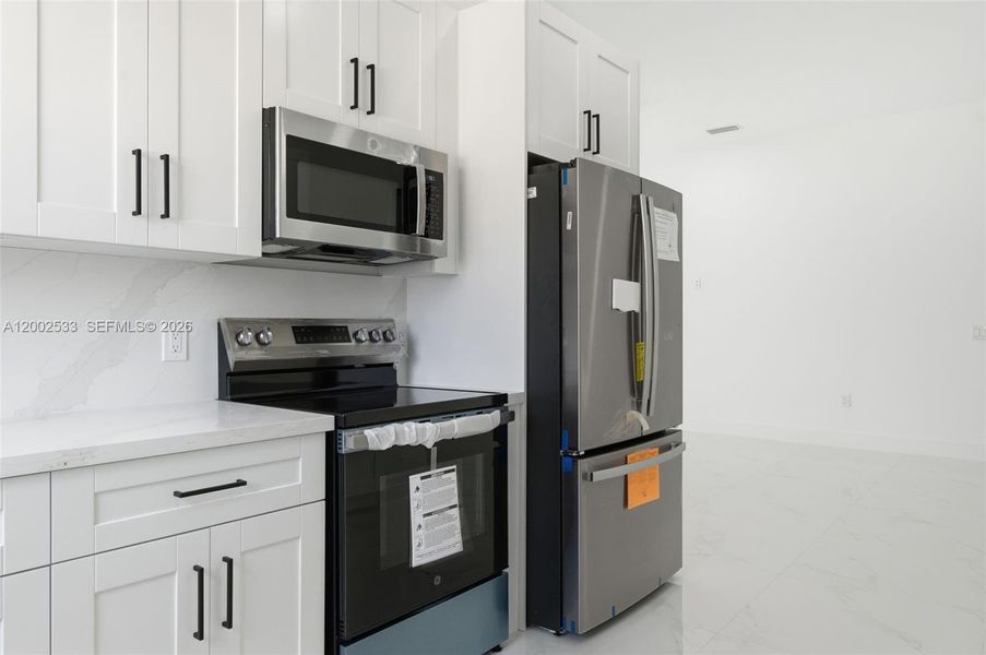 Furnished interior view inside a new home in , Lehigh Acres (Image 11).