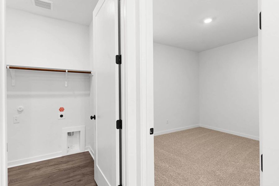 Spacious, unfurnished interior of a new home in Lariat, Liberty Hill (Image 77).