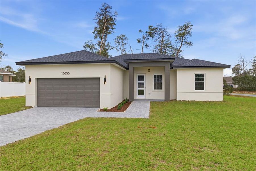 Front exterior of a new home in , Ocala, FL, highlighting curb appeal (Image 21).