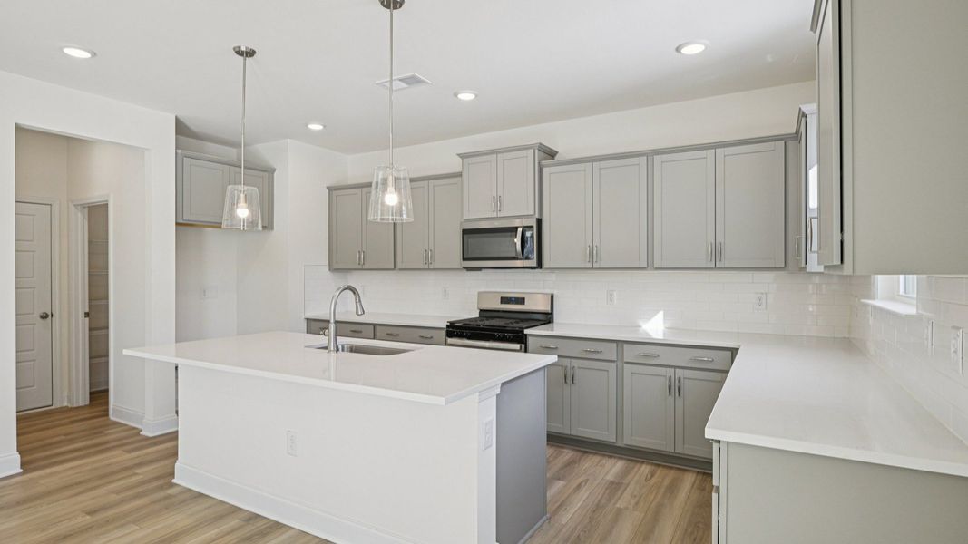 Representative furnished interior of a home built from the Wagener by DRB Homes in Station Pointe, Angier (Image 15).
