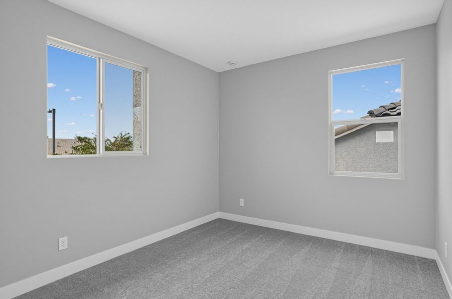 Spacious, unfurnished interior of a new home in Rancho Mercado, Surprise (Image 24).