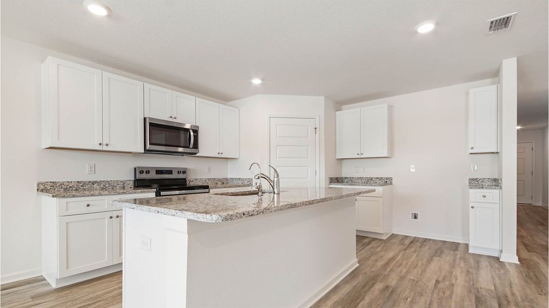 Representative furnished interior of a home built from the Ryder by D.R. Horton in Ashton Park Phase III, Freeport (Image 9).