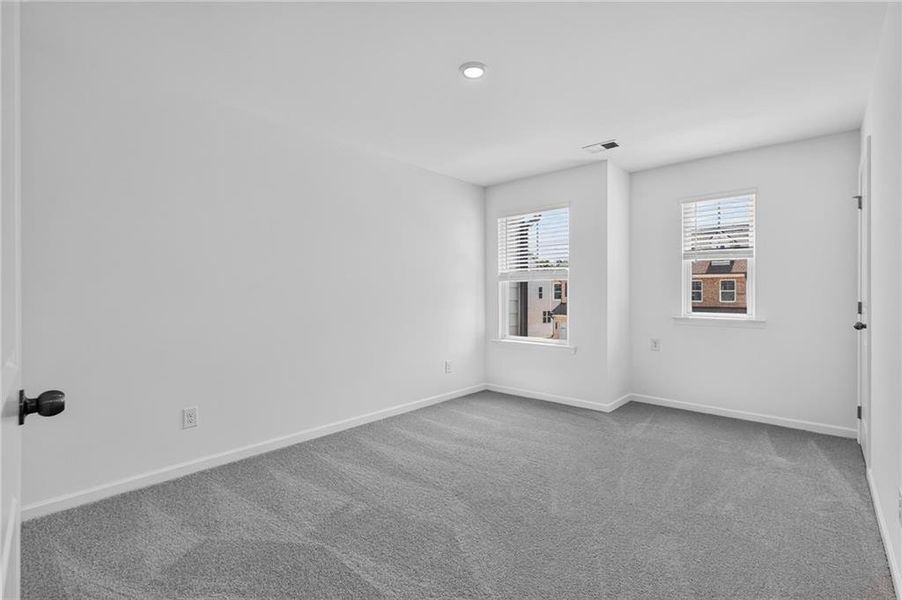 Spacious, unfurnished interior of a new home in Towns at Holly Springs, Holly Springs (Image 10). Spacious, unfurnished interior of a new home in Towns at Holly Springs, Holly Springs (Image 10).
