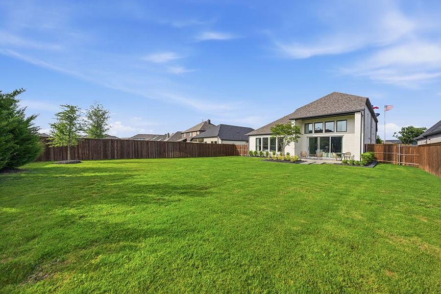 Exterior details and patio area of a home in Devonshire, Forney (Image 4).