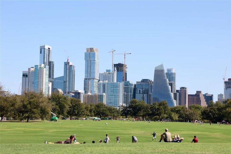 Zilker Park, Austin’s crown jewel, features lush green spaces, downtown views, and vibrant community events.