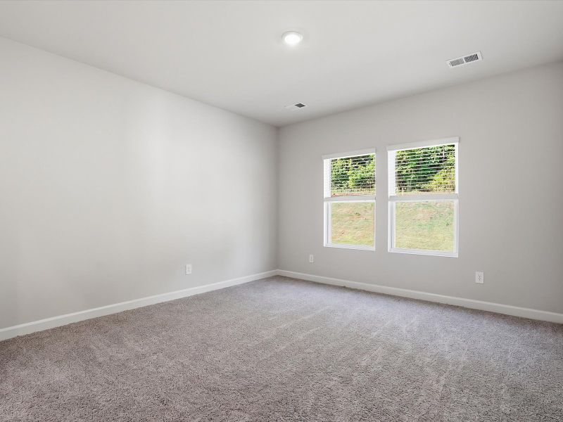 Spacious, unfurnished interior of a new home in Brayfield Manor - Heritage Collection, Wellford (Image 16).