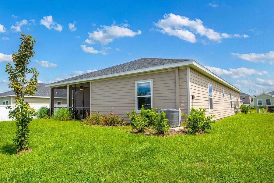 Exterior details and patio area of a home in Trailhead Landing, Alachua (Image 32).
