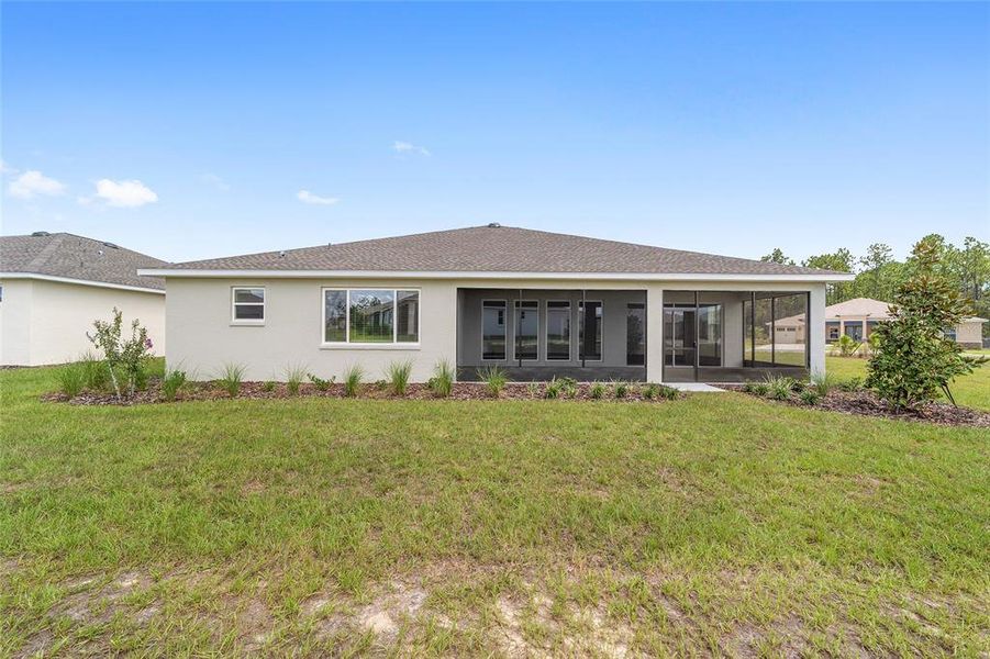 Front exterior of a new home in On Top of the World Communities, Ocala, FL, highlighting curb appeal (Image 21).