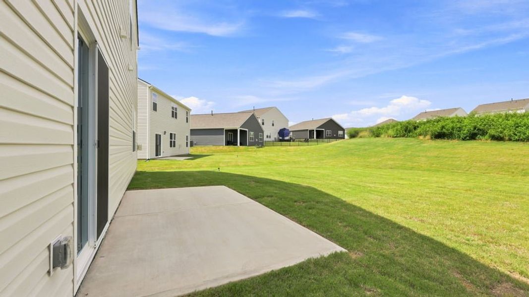 Exterior details and patio area of a home in Hunters Ridge, Woodruff (Image 21).
