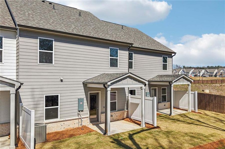 Exterior details and patio area of a home in Eastlyn Crossing, Flowery Branch (Image 3). Exterior details and patio area of a home in Eastlyn Crossing, Flowery Branch (Image 3).