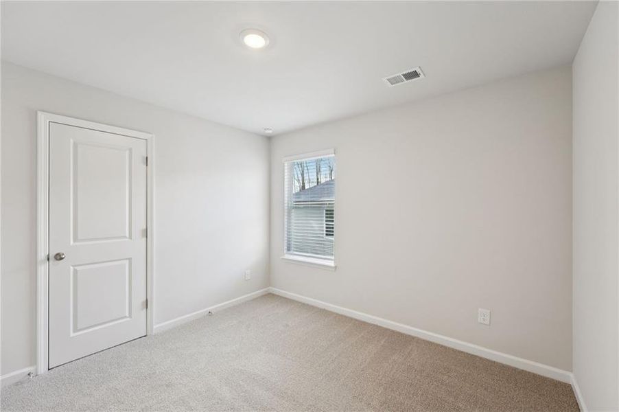 Spacious, unfurnished interior of a new home in Westmont Preserve, Powder Springs (Image 24).