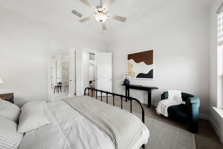 Comfortable bedroom with neutral tones and a modern aesthetic.