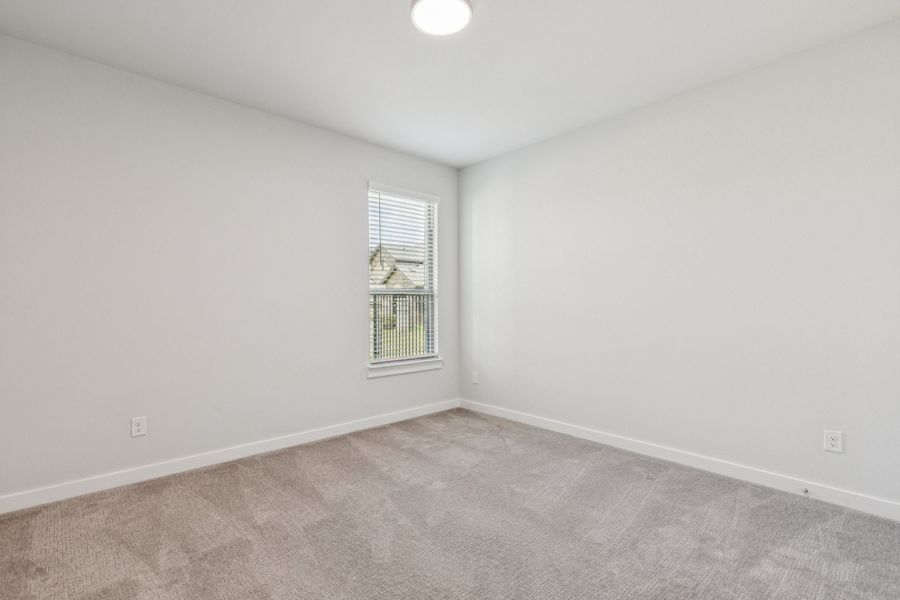 Bedroom in the Mercury home plan by Trophy Signature Homes – REPRESENTATIVE PHOTO Bedroom in the Mercury home plan by Trophy Signature Homes – REPRESENTATIVE PHOTO