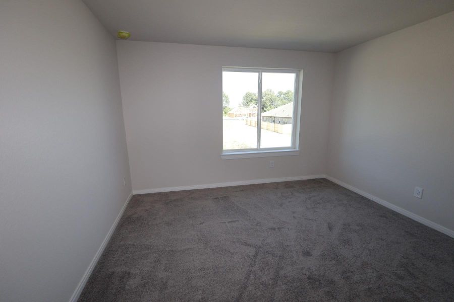Spacious, unfurnished interior of a new home in Sundance Cove Lakeside - Overlook View Collection, Crosby (Image 7).