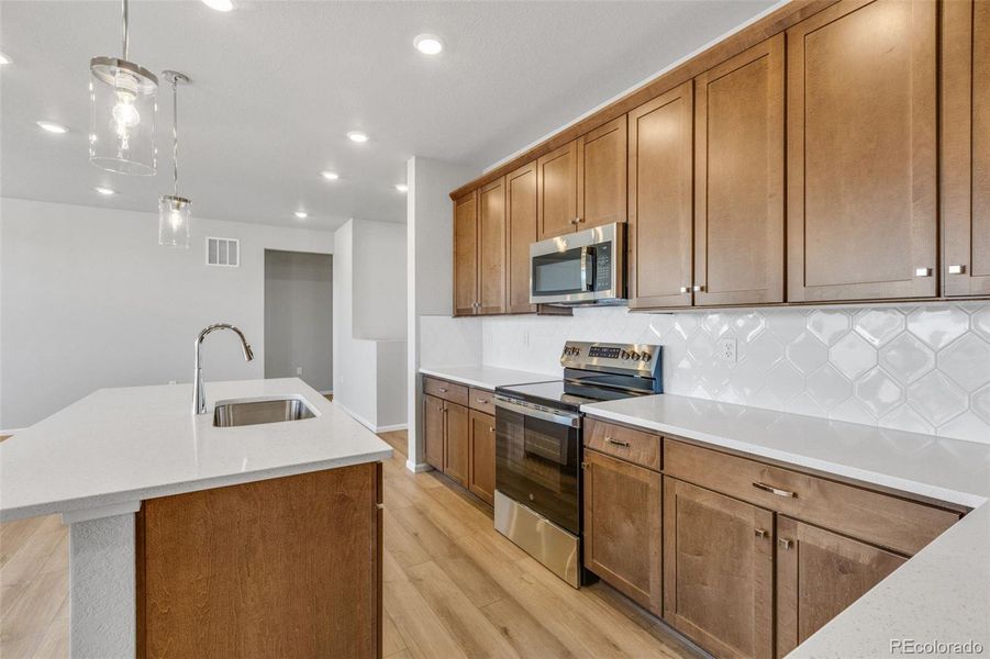 Furnished interior view inside a new home in The Legacy Collection at Talon Pointe, Thornton (Image 7).