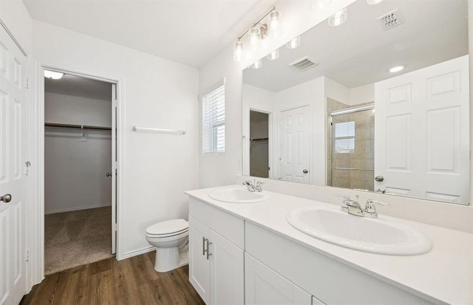 Owner's private bath with double sinks Owner's private bath with double sinks