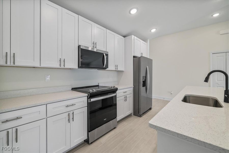 Furnished interior view inside a new home in Cape Coral, Cape Coral (Image 9).