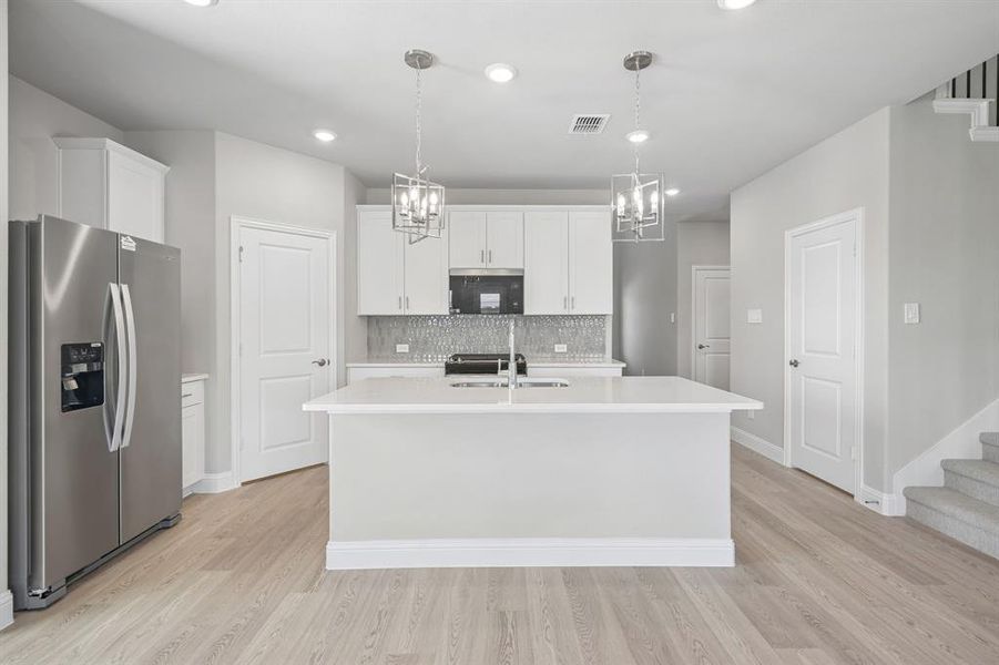 Furnished interior view inside a new home in Lakehaven - Signature Series, Farmersville (Image 12).