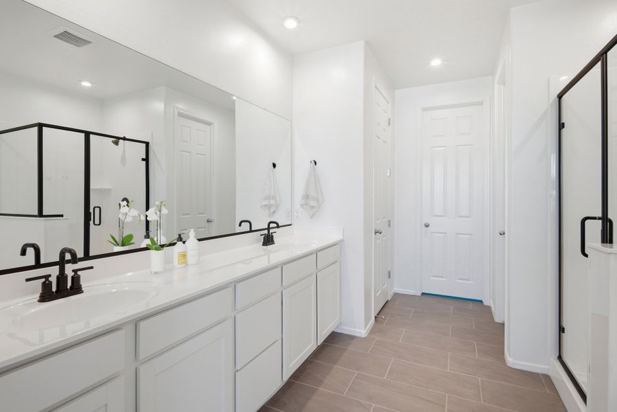 Furnished interior view inside a new home in Marbella at Windrose, Waddell (Image 10).