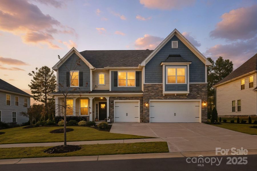 Front exterior of a new home in , Huntersville, NC, highlighting curb appeal (Image 21). Front exterior of a new home in , Huntersville, NC, highlighting curb appeal (Image 21).