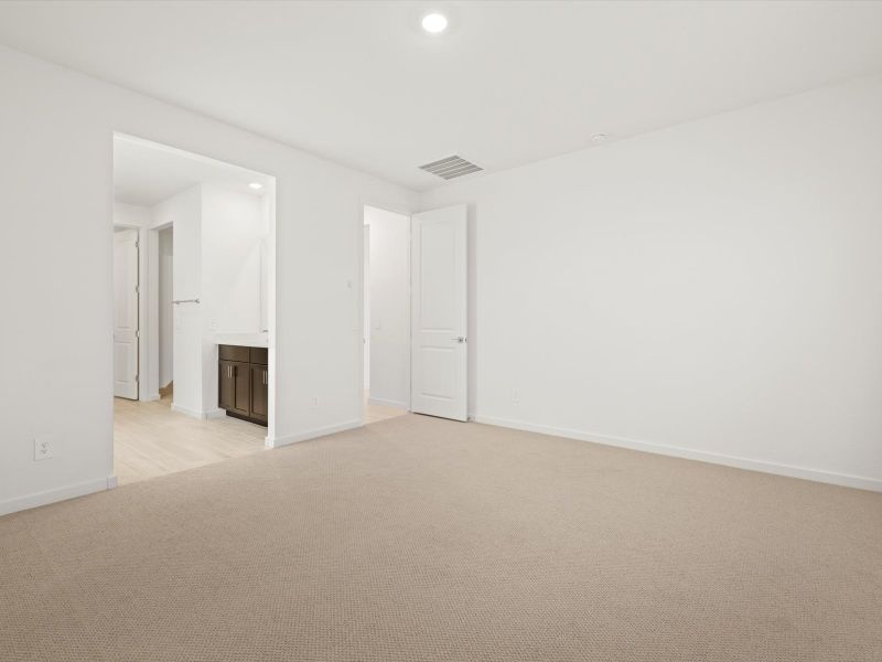 Spacious, unfurnished interior of a new home in Mountain View Estates Signature Series, Buckeye (Image 13).