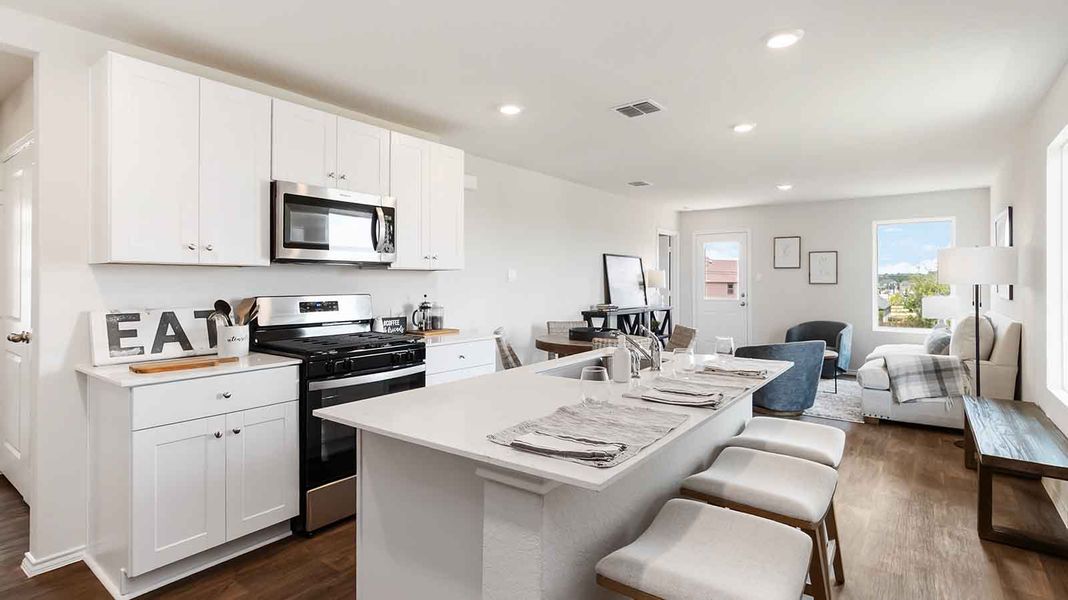 Representative furnished interior of a home built from the Atlanta by D.R. Horton in Watermark, Alvin (Image 4).