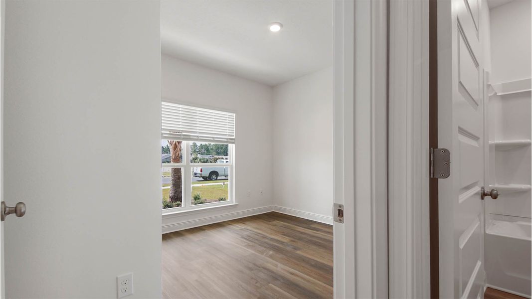 Representative unfurnished interior of a home built from the Rhett by D.R. Horton in Caballeros Estates At Hombre, Panama City Beach (Image 25).