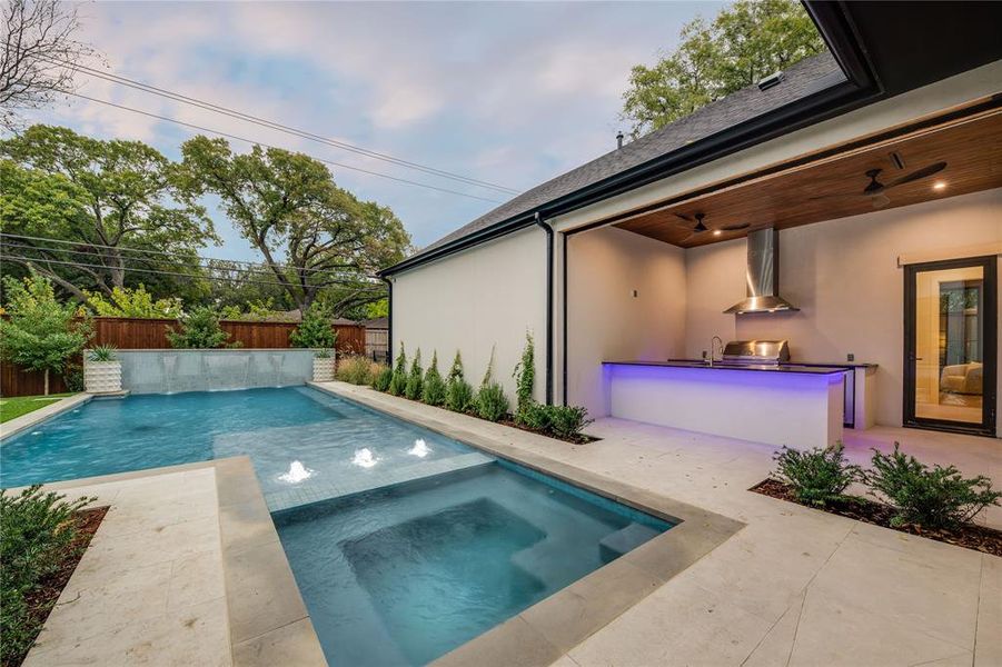 Pool with outdoor kitchen