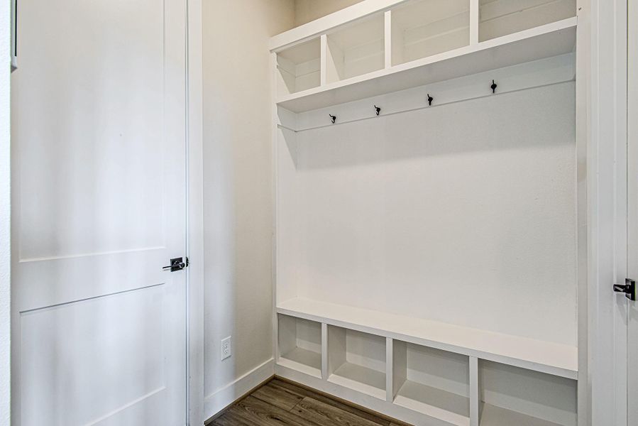 Convenient built-in drop zone with upper shelving, hooks, and lower storage
