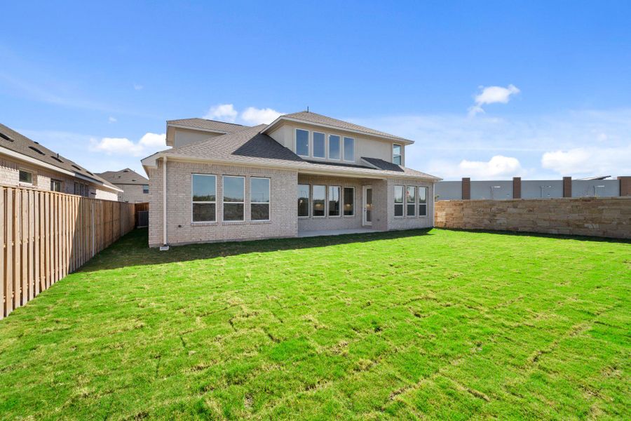 Rear of Home and Private Backyard