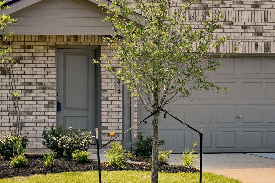 Exterior details and patio area of a home in Meadow Park, Conroe (Image 2). Exterior details and patio area of a home in Meadow Park, Conroe (Image 2).