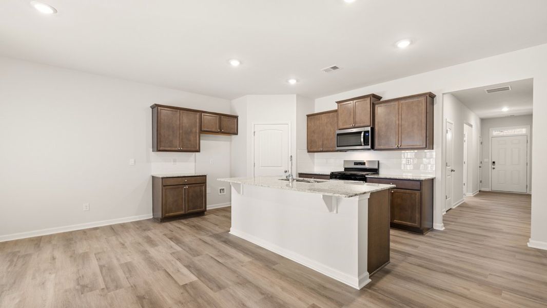 Representative furnished interior of a home built from the Cali by D.R. Horton in South Wind, South Fulton (Image 7).