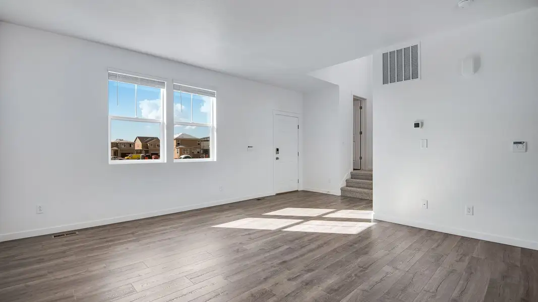 Spacious, unfurnished interior of a new home in Sky Ranch, Watkins (Image 13).