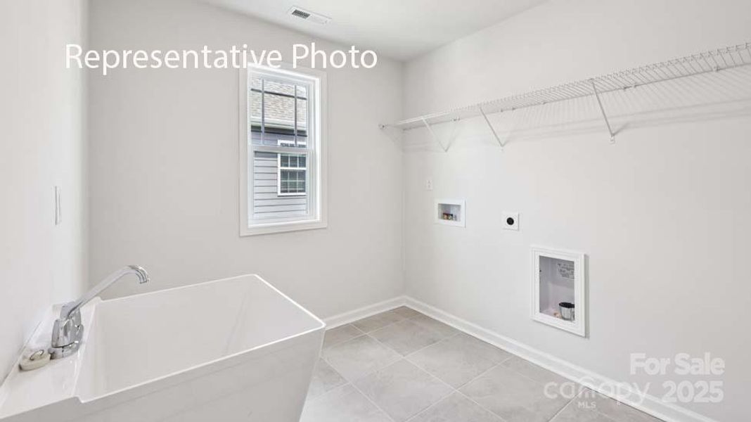 Spacious, unfurnished interior of a new home in Sanctuary at Southgate, Indian Trail (Image 15).