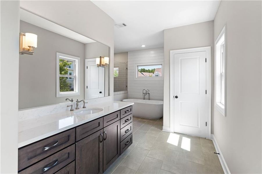 Furnished interior view inside a new home in Bellwyn, Johns Creek (Image 18).