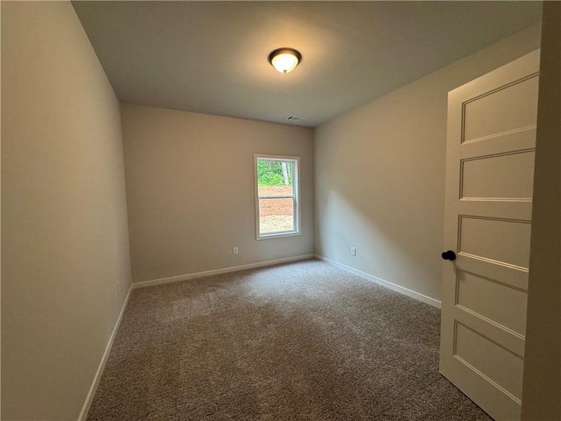 Spacious, unfurnished interior of a new home in Rosewood Lake Preserve, Hoschton (Image 32).
