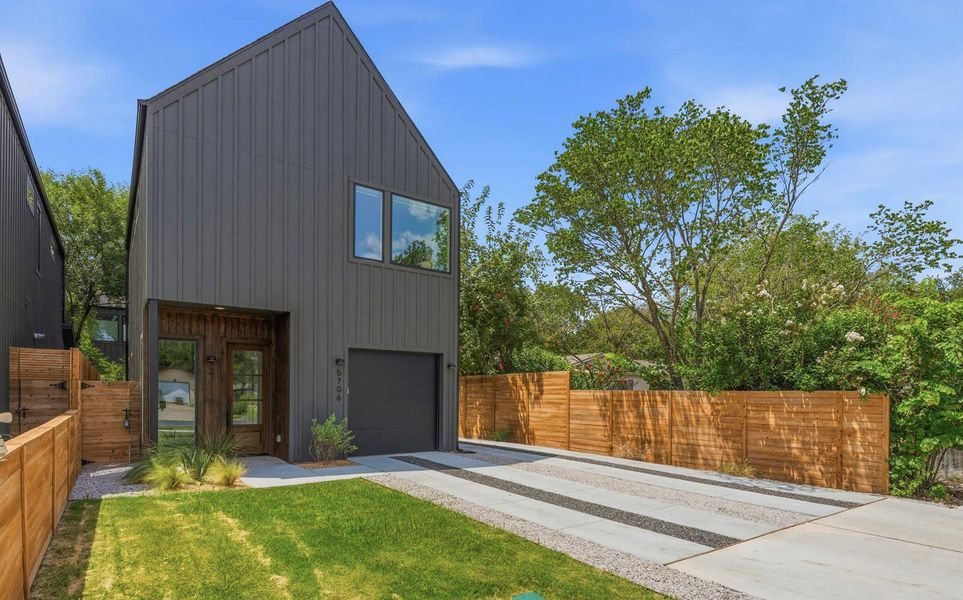 Front exterior of a new home in , Austin, TX, highlighting curb appeal (Image 1). Front exterior of a new home in , Austin, TX, highlighting curb appeal (Image 1).
