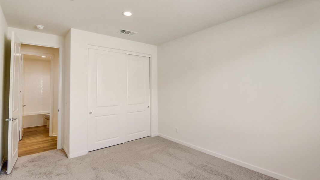 Representative unfurnished interior of a home built from the Residence 3003 by D.R. Horton in Havenwood, North Charleston (Image 42).
