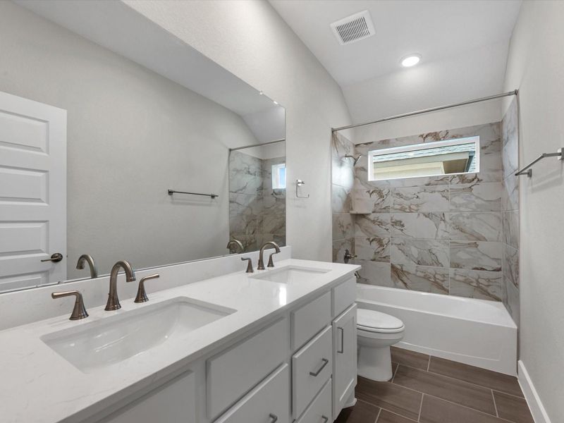 Furnished interior view inside a new home in Dunham Pointe, Cypress (Image 10).