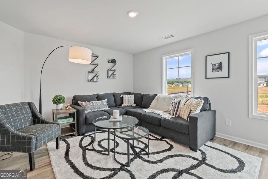 Furnished interior view inside a new home in Ponderosa Farms Manor, Gainesville (Image 53).