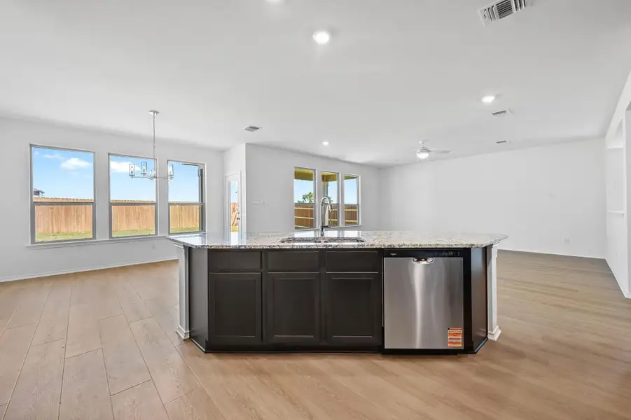 Furnished interior view inside a new home in Salerno - Classic Collection, Round Rock (Image 10). Furnished interior view inside a new home in Salerno - Classic Collection, Round Rock (Image 10).