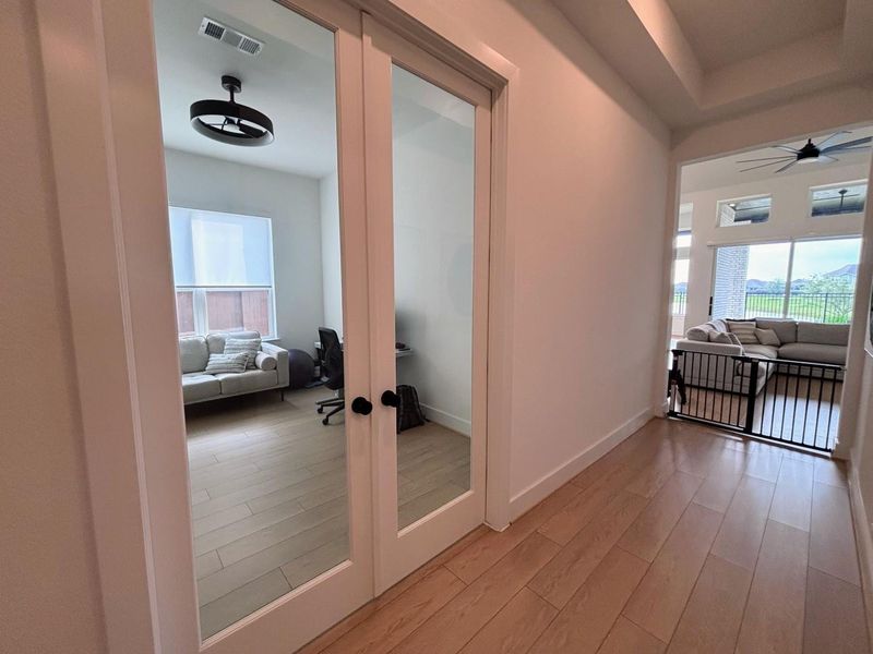 Hallway leading to the studio/office and living room.