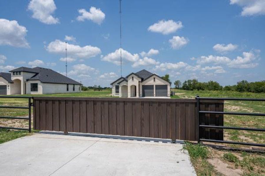 Front exterior of a new home in , Corsicana, TX, highlighting curb appeal (Image 1). Front exterior of a new home in , Corsicana, TX, highlighting curb appeal (Image 1).