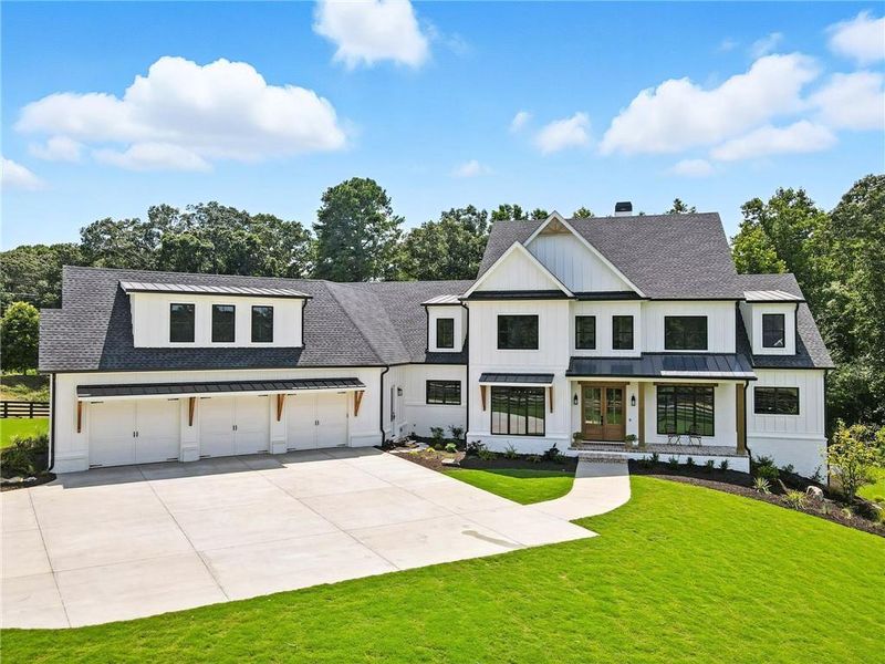 Front exterior of a new home in , Canton, GA, highlighting curb appeal (Image 28).