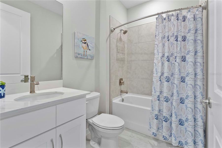 Furnished interior view inside a new home in Palmetto Landing at Babcock Ranch - Tradition, Punta Gorda (Image 8).
