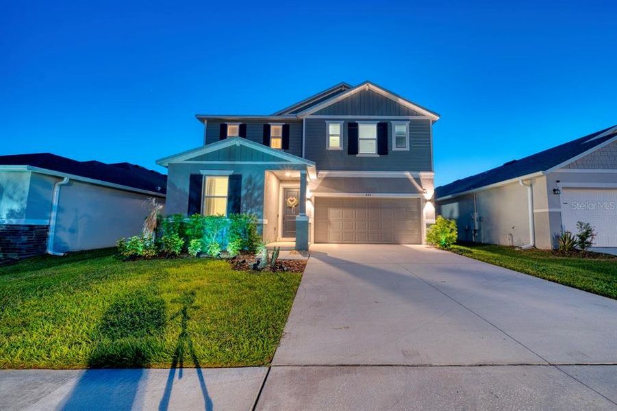 Front exterior of a new home in , Davenport, FL, highlighting curb appeal (Image 2). Front exterior of a new home in , Davenport, FL, highlighting curb appeal (Image 2).