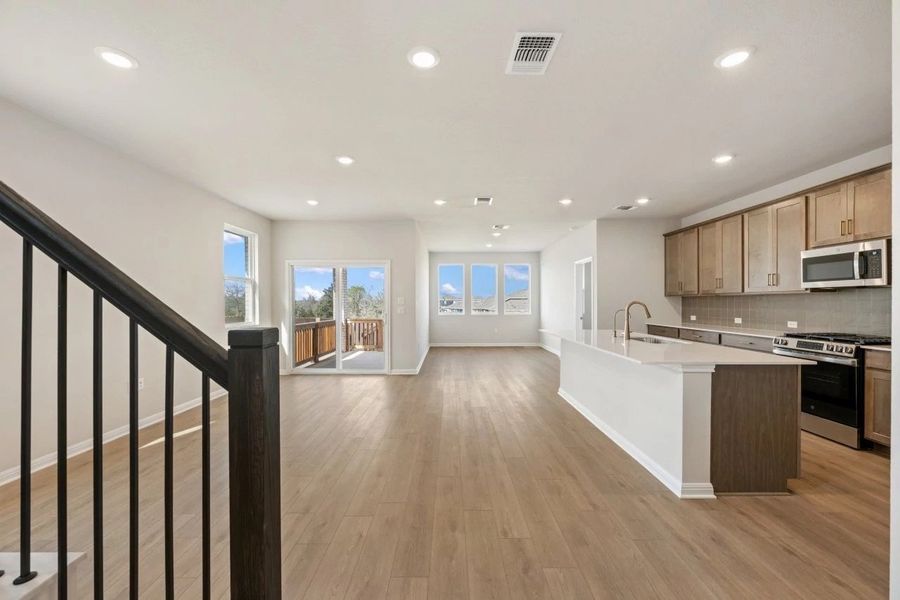 Furnished interior view inside a new home in The Colony, Bastrop (Image 6).