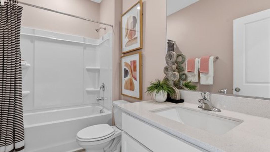Furnished interior view inside a new home in The Townes at Madden West, Fuquay Varina (Image 15). Furnished interior view inside a new home in The Townes at Madden West, Fuquay Varina (Image 15).