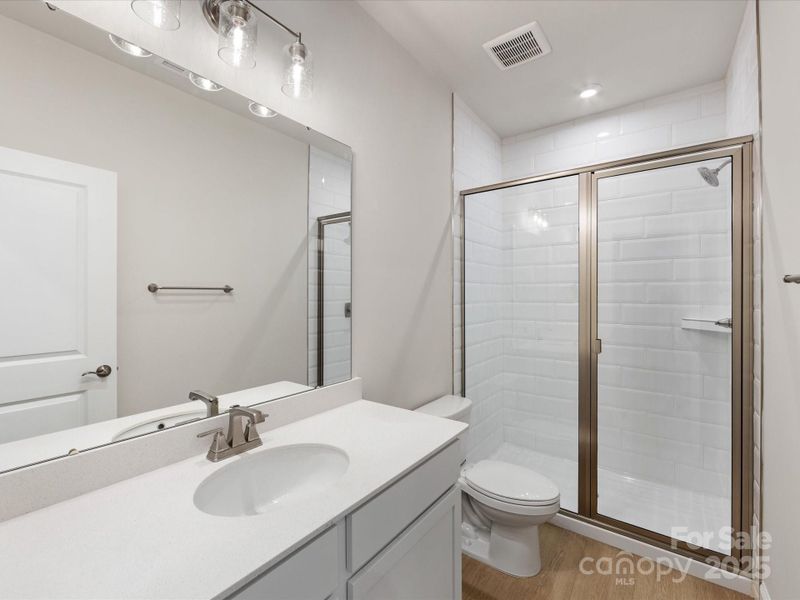 First Floor Guest Bath With Modern Walk-In Shower