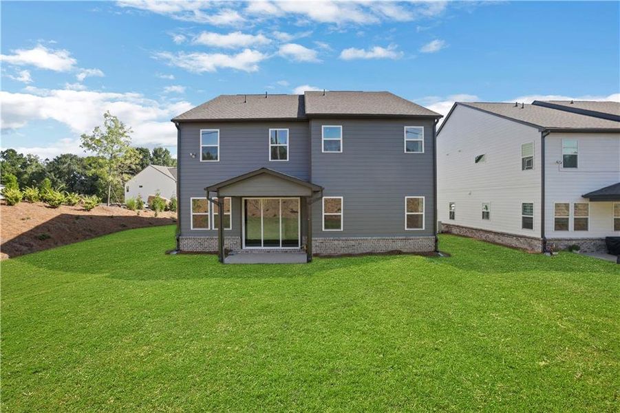 Exterior details and patio area of a home in The Paddocks at Doc Hughes, Buford (Image 29).
